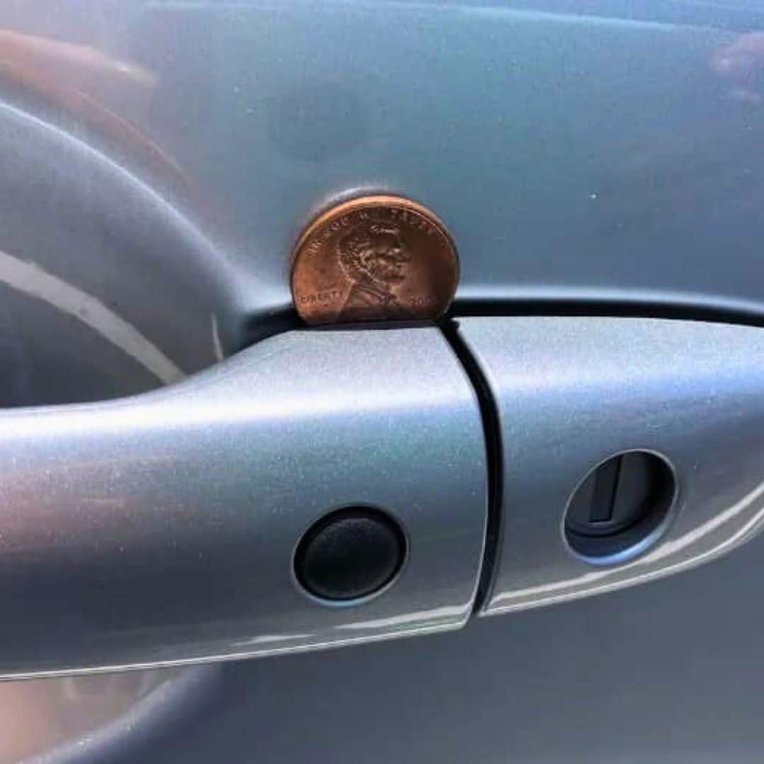 If You Ever Notice a Penny in Your Car Door Handle What It Could Signal and Why Staying Alert Matters