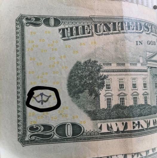 The Real Meaning Behind Arrow Symbols on U.S. Money